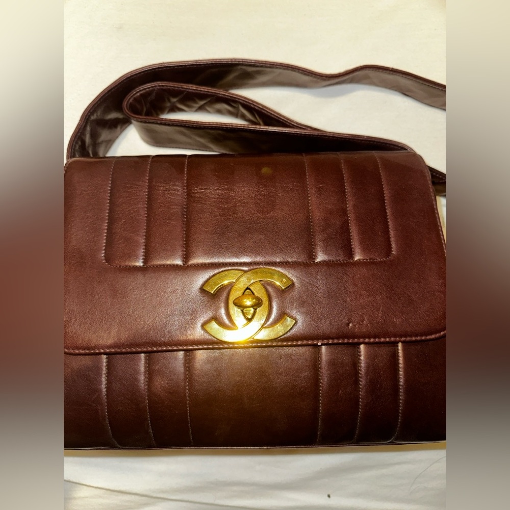 CHANEL - 24K Gold Plated Large CC Vertical Flap in Brown Lambskin Leather.